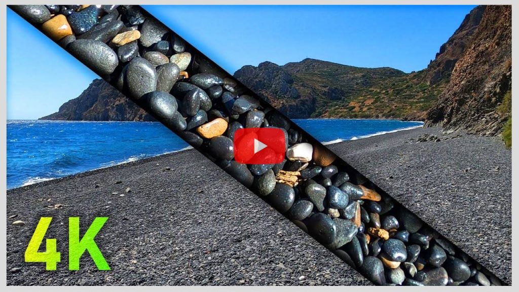 4k Sound of Walking on a Beach with Black Pebbles by the Rough Blue Sea