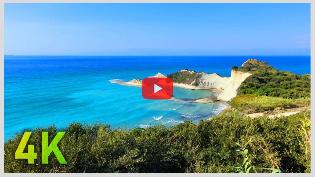 Boating from Cape Drastis Scenic of Corfu and by its sea caves to Sidari village 4k landscape